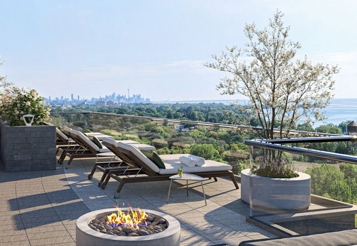 Exhale Condos Rooftop Terrace with Seating and Downtown Skyline View